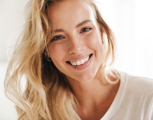 Closeup of woman with blonde hair smiling