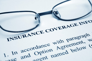 Glasses on top of dental insurance information form